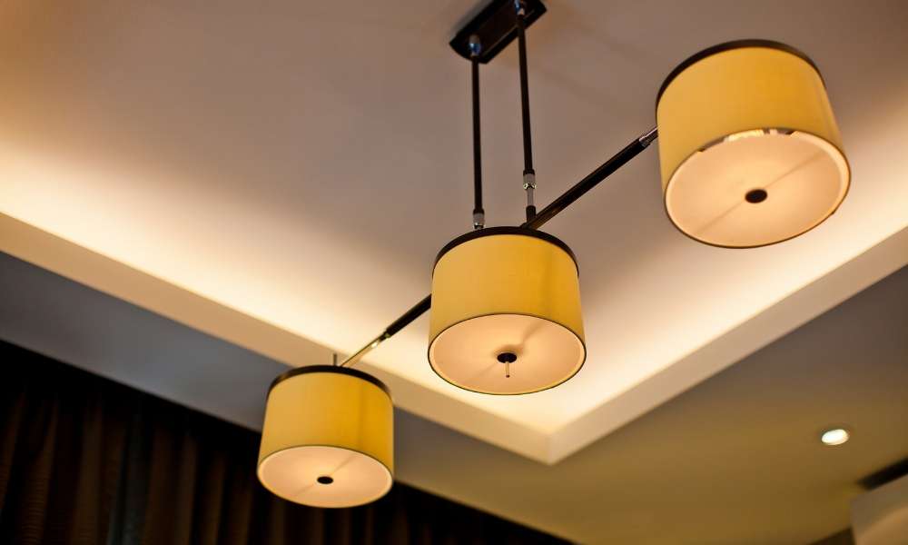 Which must be located near the top of the fixture