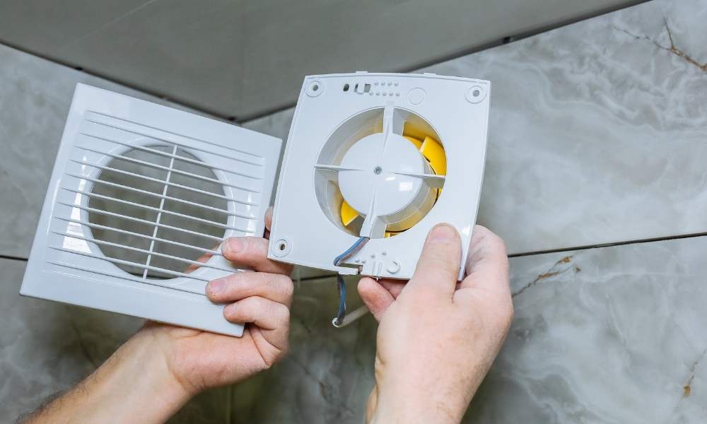 Cleaning The Motor and Housing in Clean Bathroom Exhaust Fan With Light