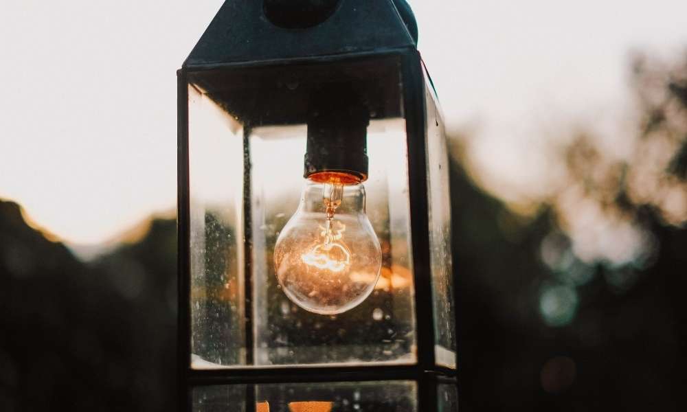 Place the Light Bulb Inside the Glass Container