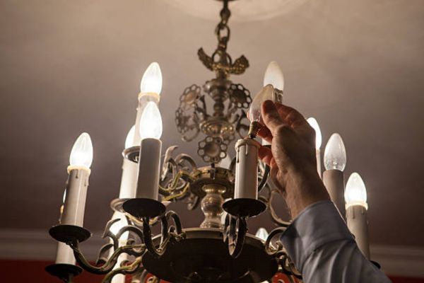 Why Changing Chandelier Bulbs in High Places Feels So Tricky